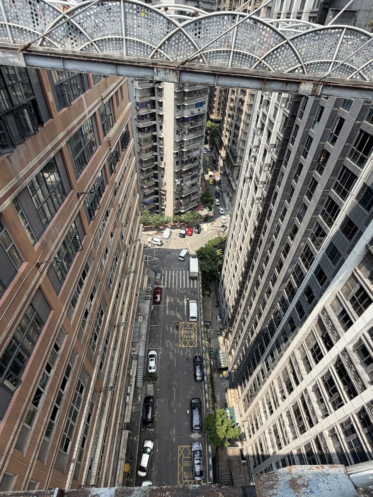 A street seen from high above between towers at Kuixing Tower, Chongqing