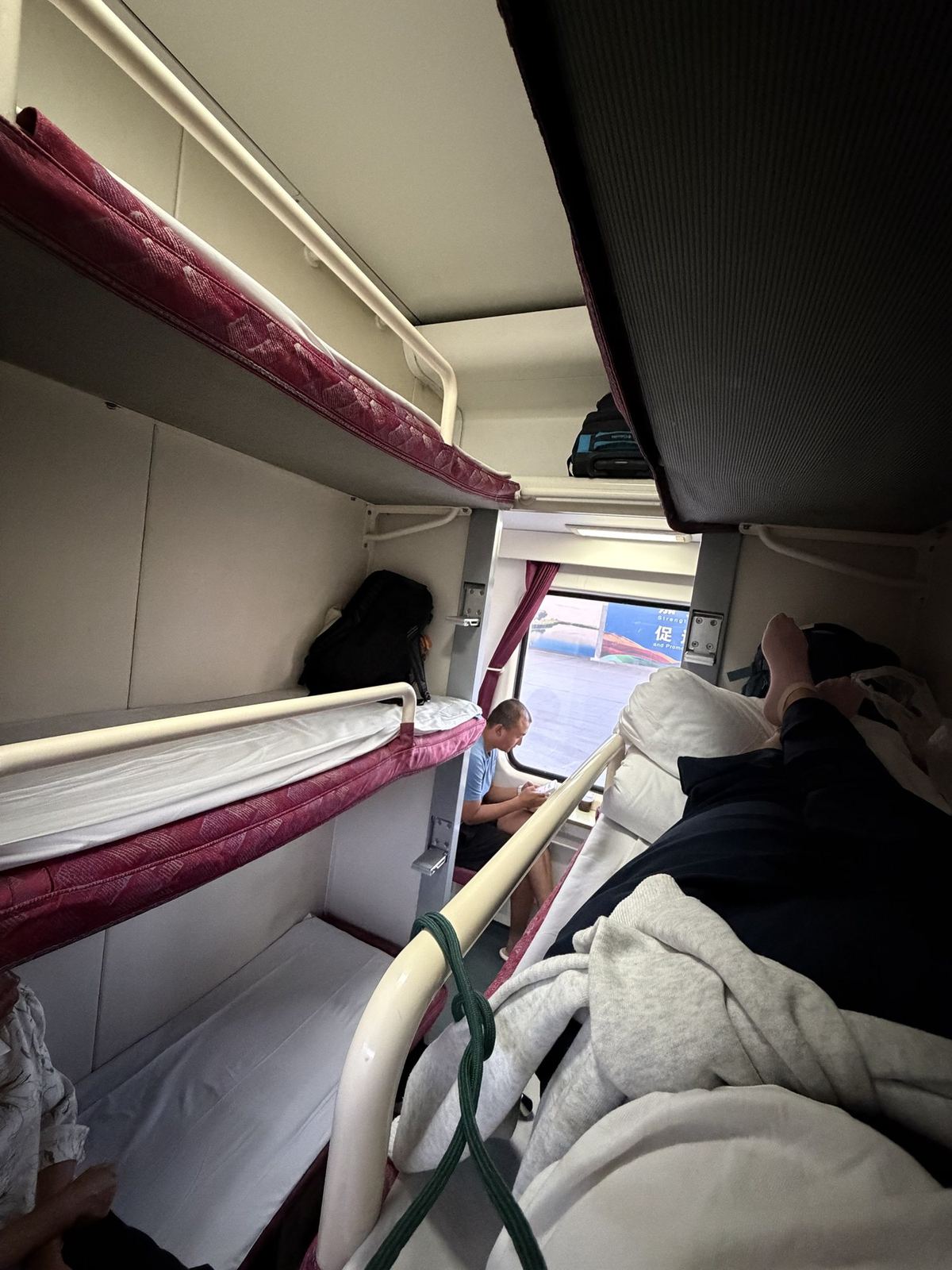 Bunk beds in a hard sleeper cabin on the night train from Dunhuang to Zhangye