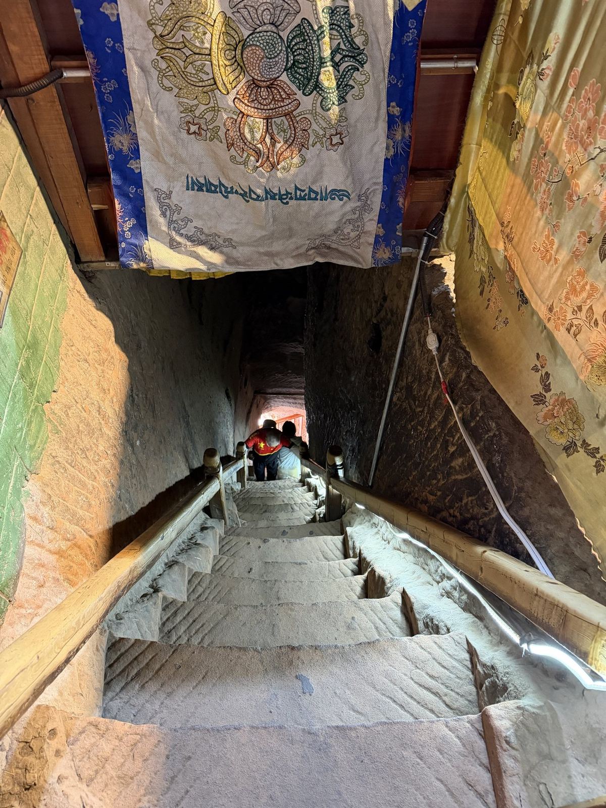 Steep stairs carved through the rock inside Mati Temple