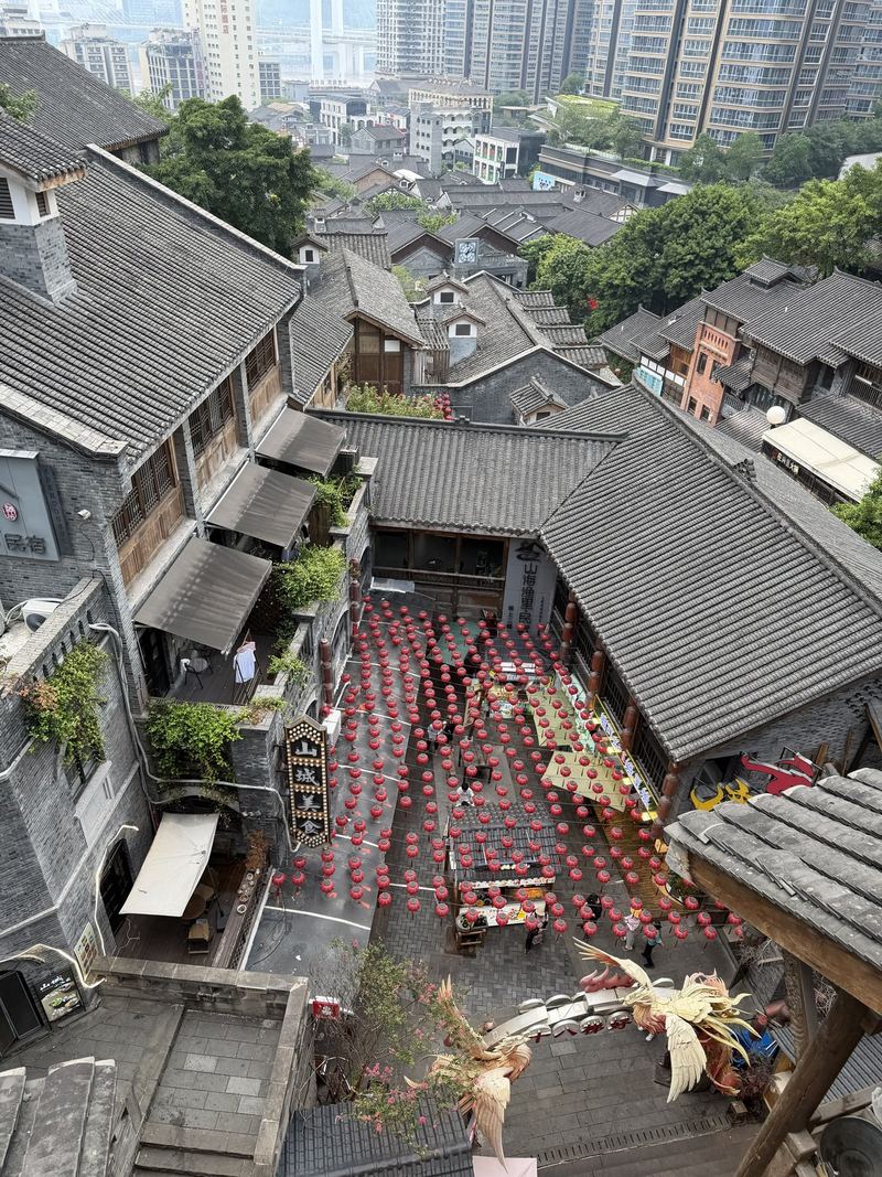 Red lanterns hanging over a courtyard of old houses at Eighteen Stairs, Chongqing