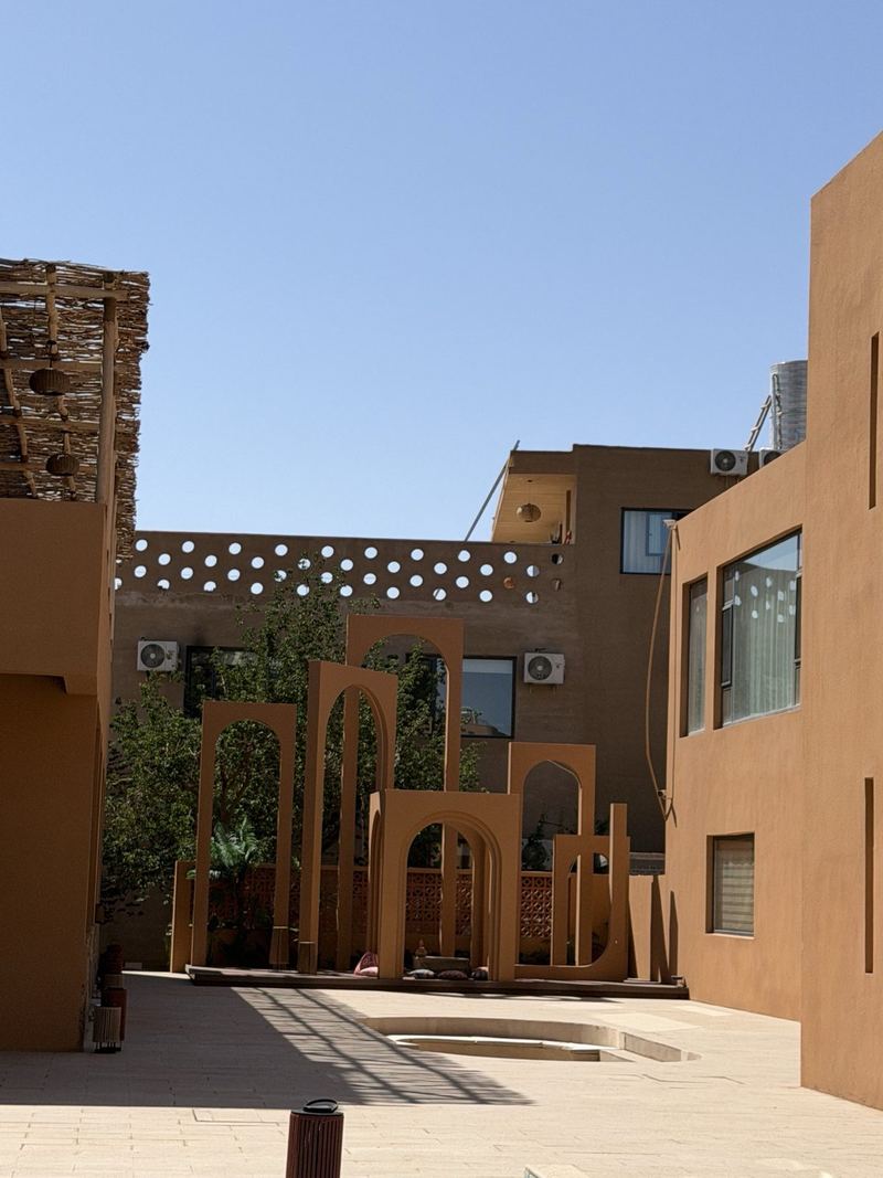 Courtyard with sculpted arches at the Boman Oasis Resort, Dunhuang