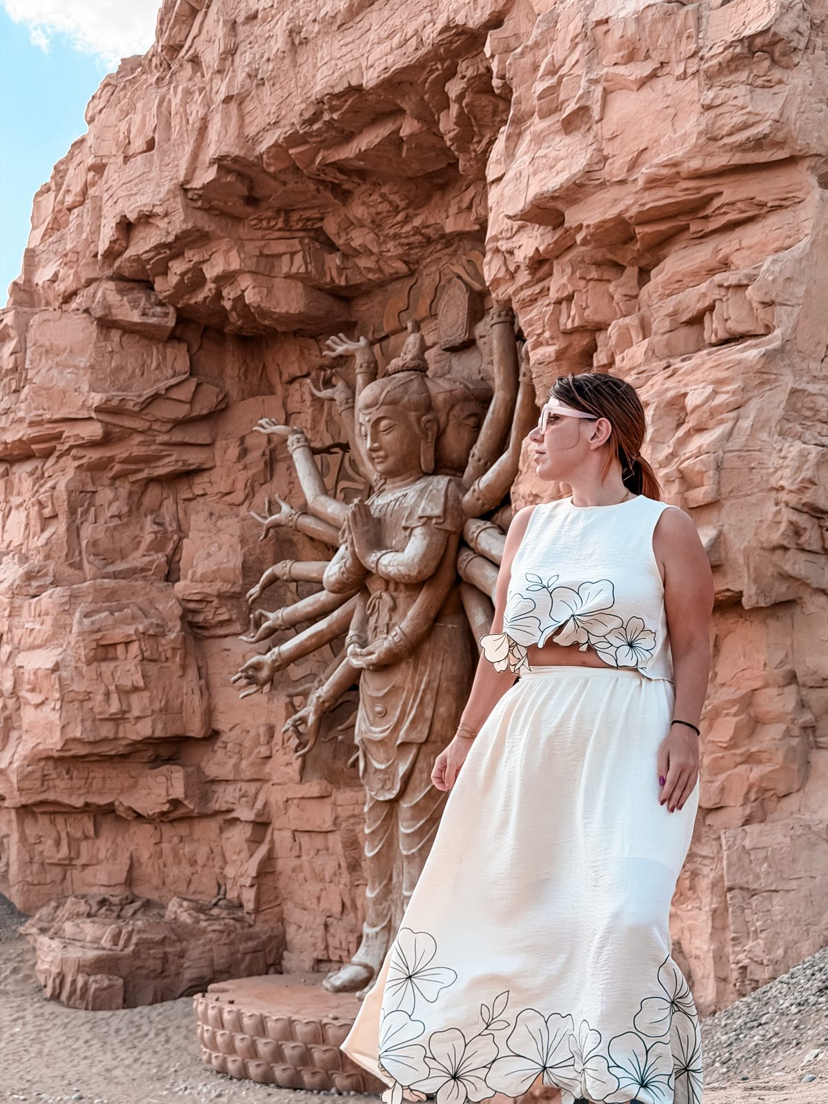 Linda next to the thousand armed Guanyin, Thousand Buddha Cliff, Dunhuang Silk Road Heritage City
