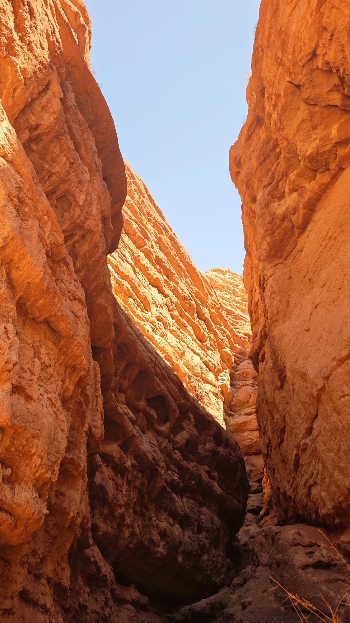 A narrow red rock gorge in the Pingshan Grand Canyon
